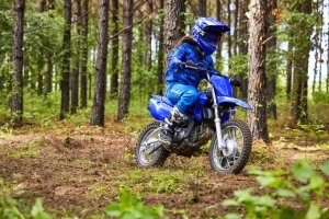 TT-R110E riding in a forest